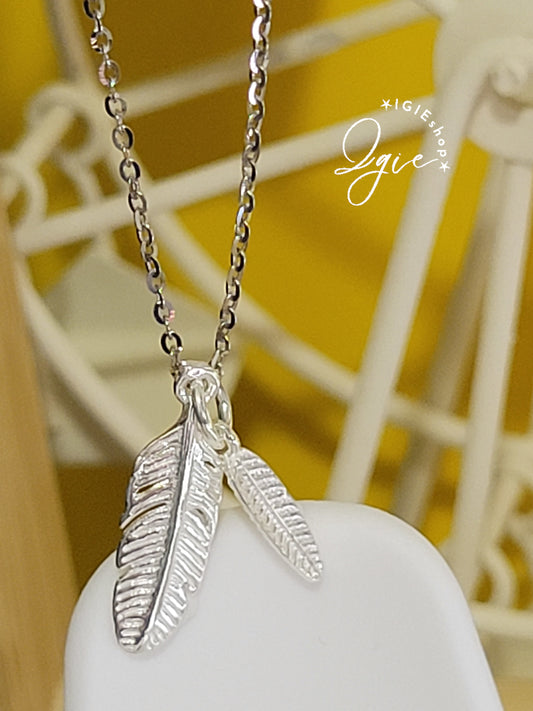 Silver necklace charm