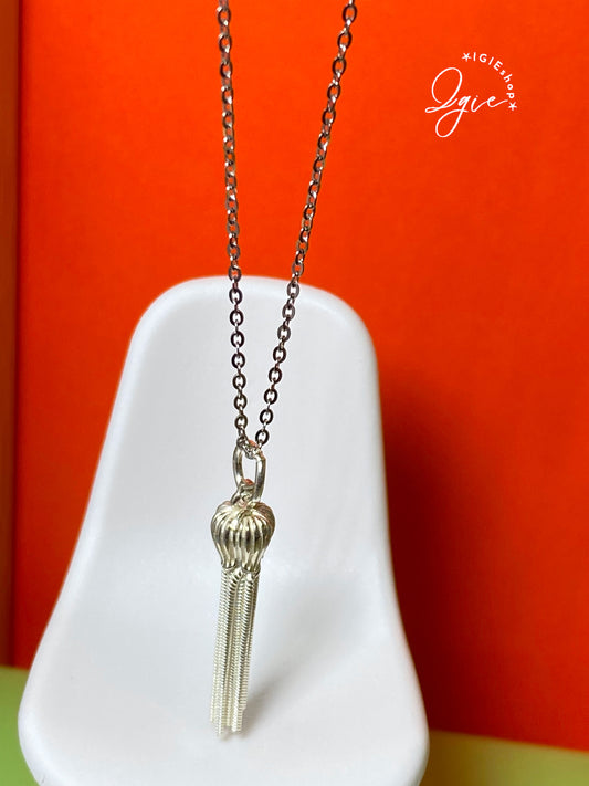 Silver necklace charm