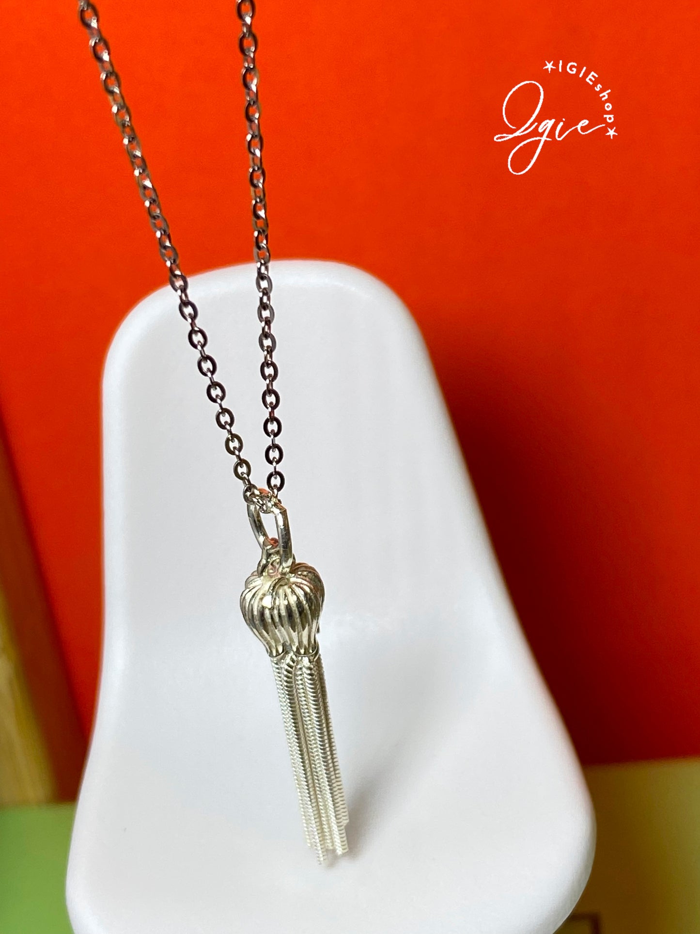 Silver necklace charm