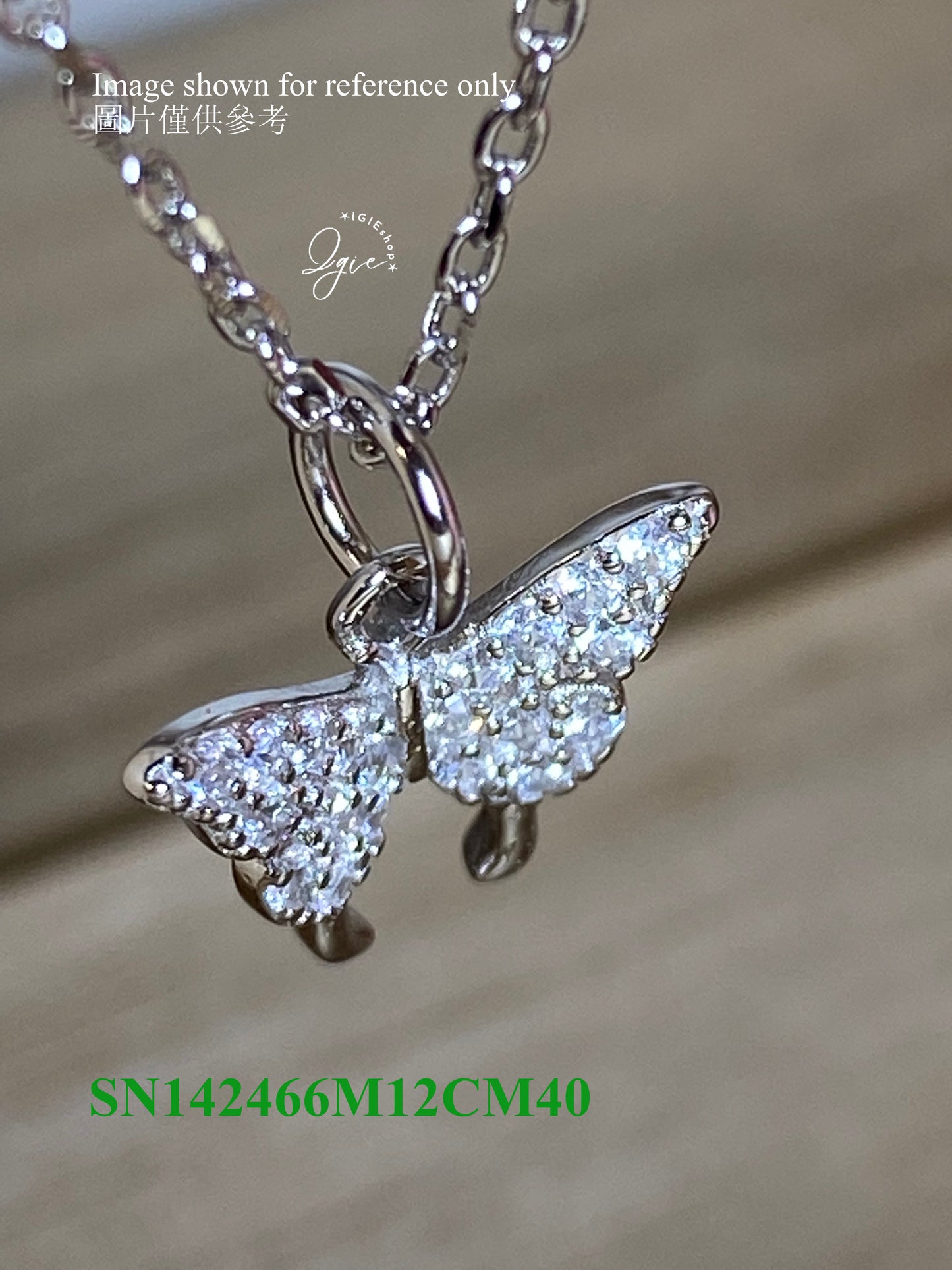 Silver necklace charm