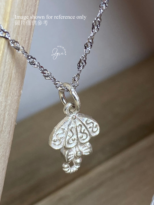 Silver necklace charm