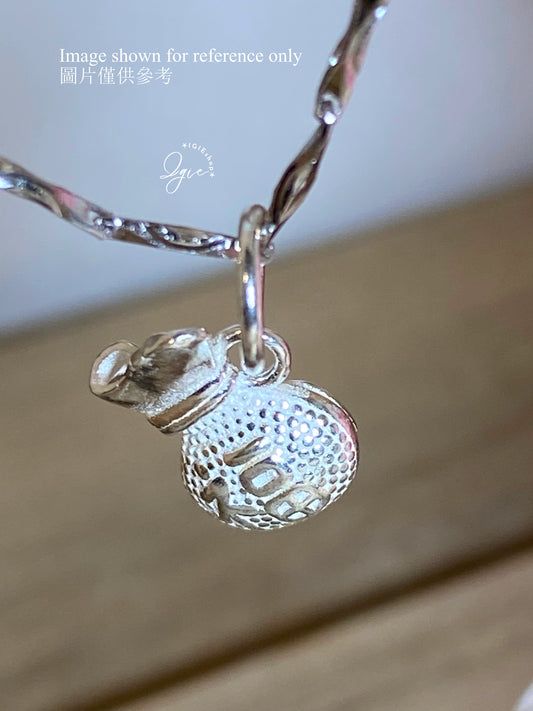 Silver necklace charm