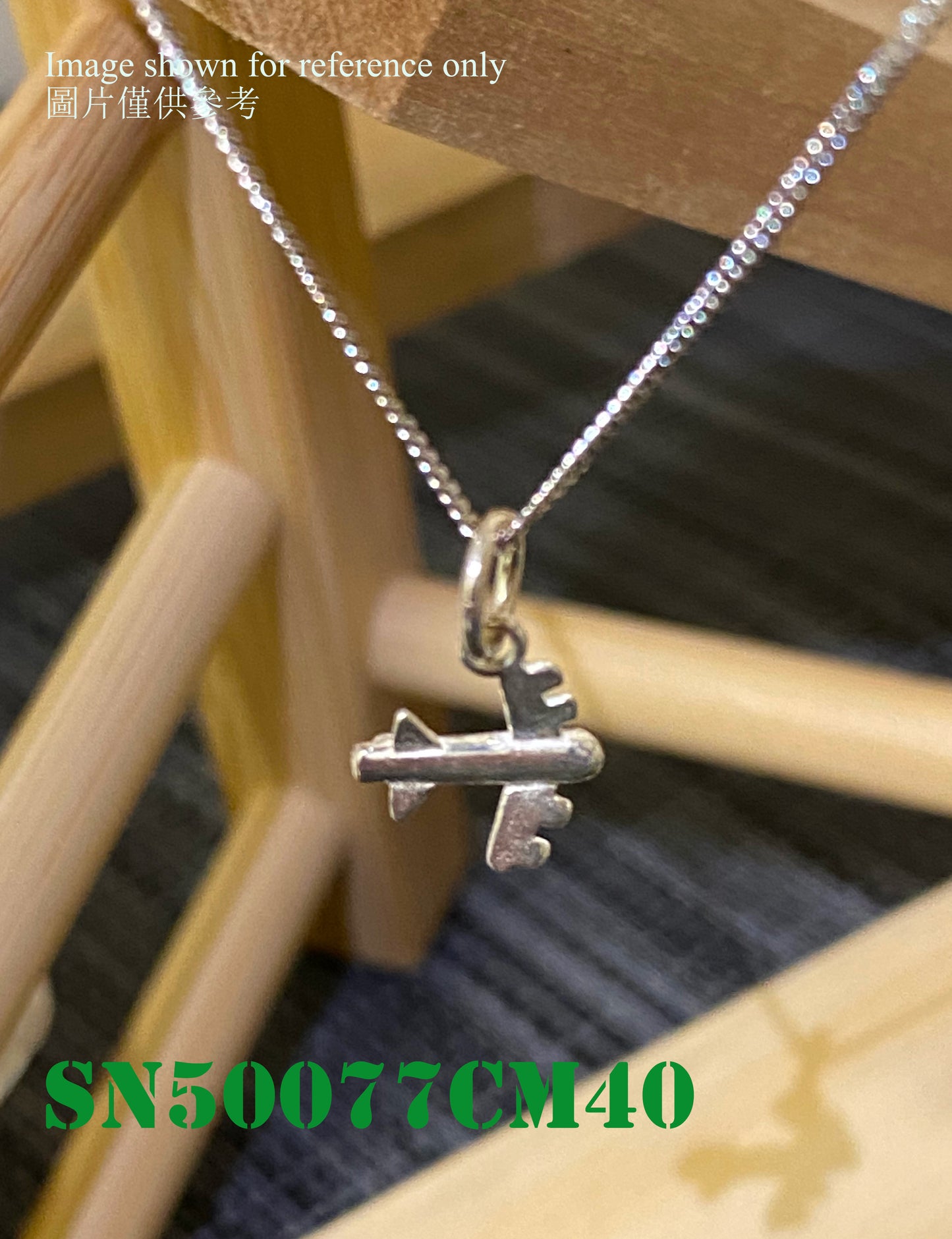 Silver necklace charm