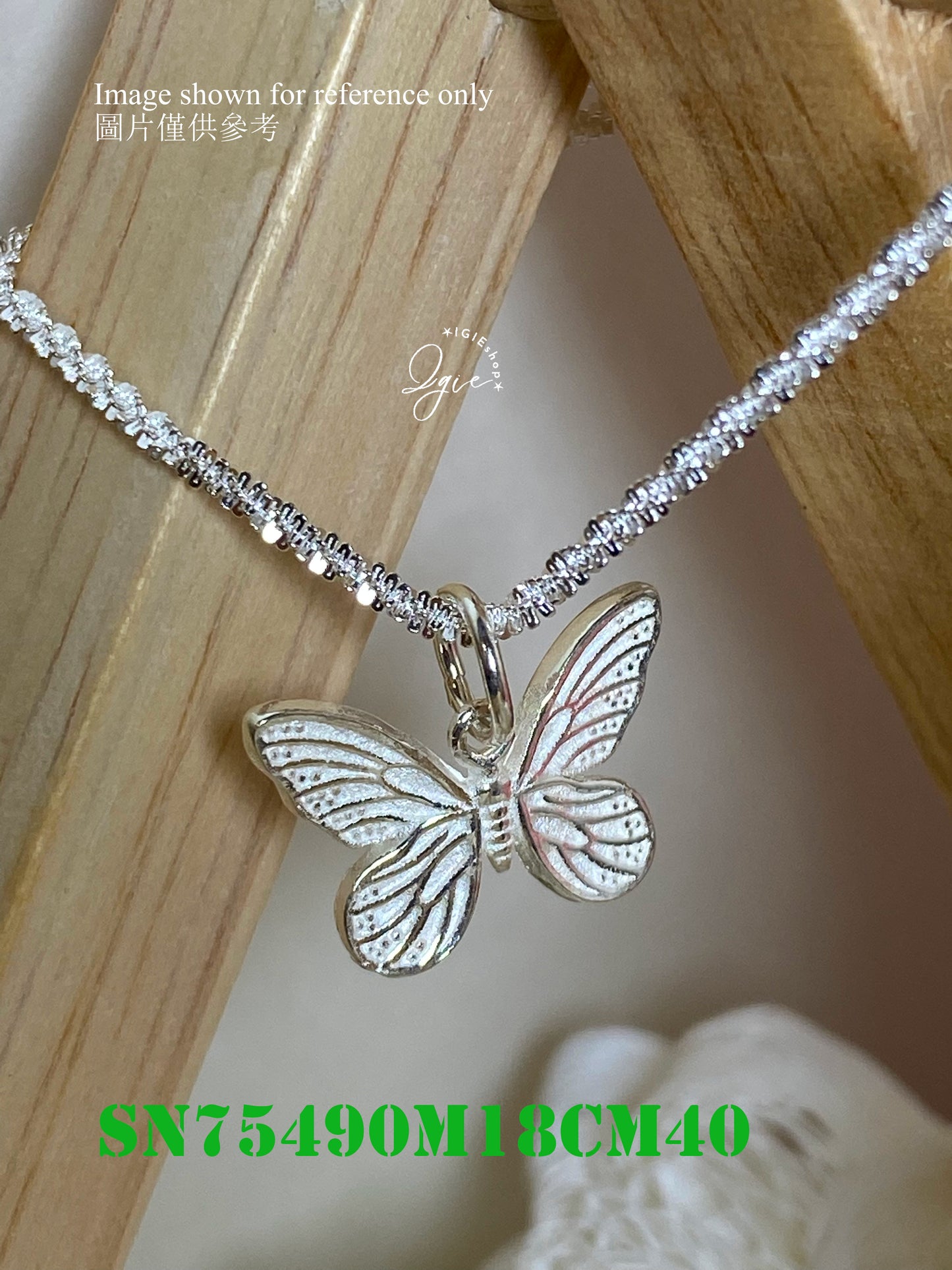 Silver necklace charm