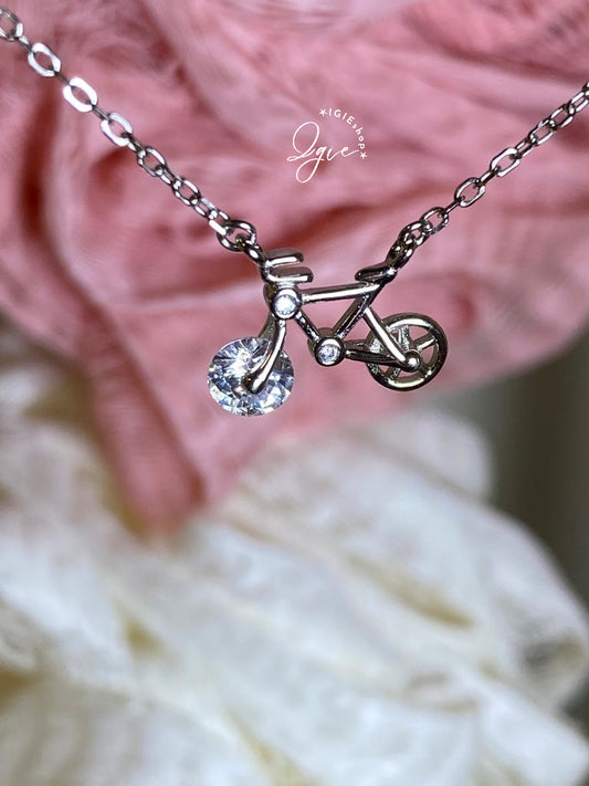 Silver necklace charm